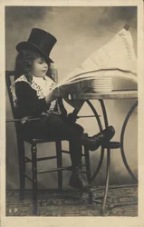 Boy Reading a Newspaper